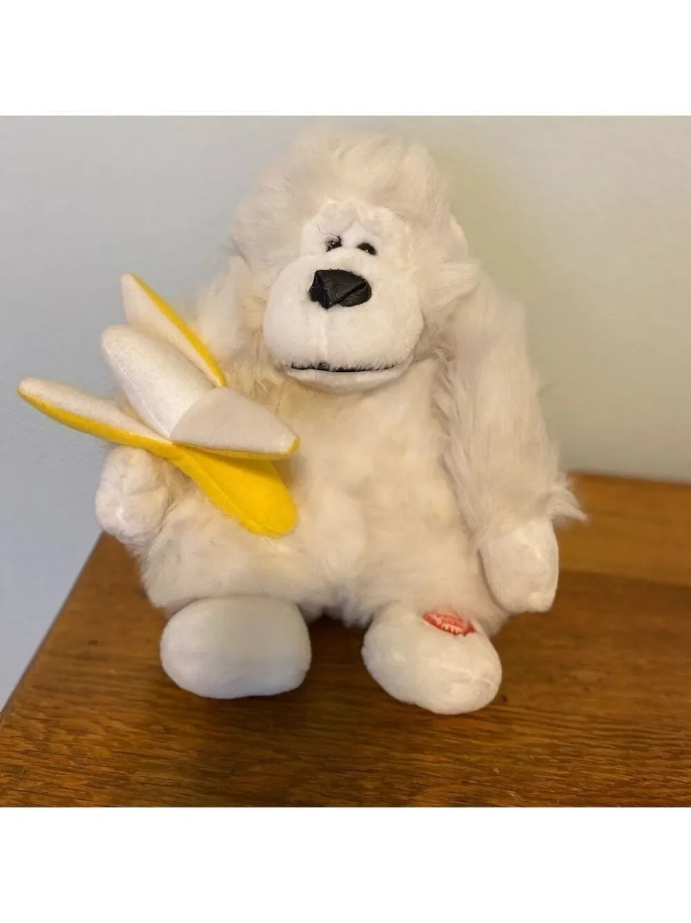 Animated stuffed Gorilla. Press button and he sings and moves Needs 2 AA Battery